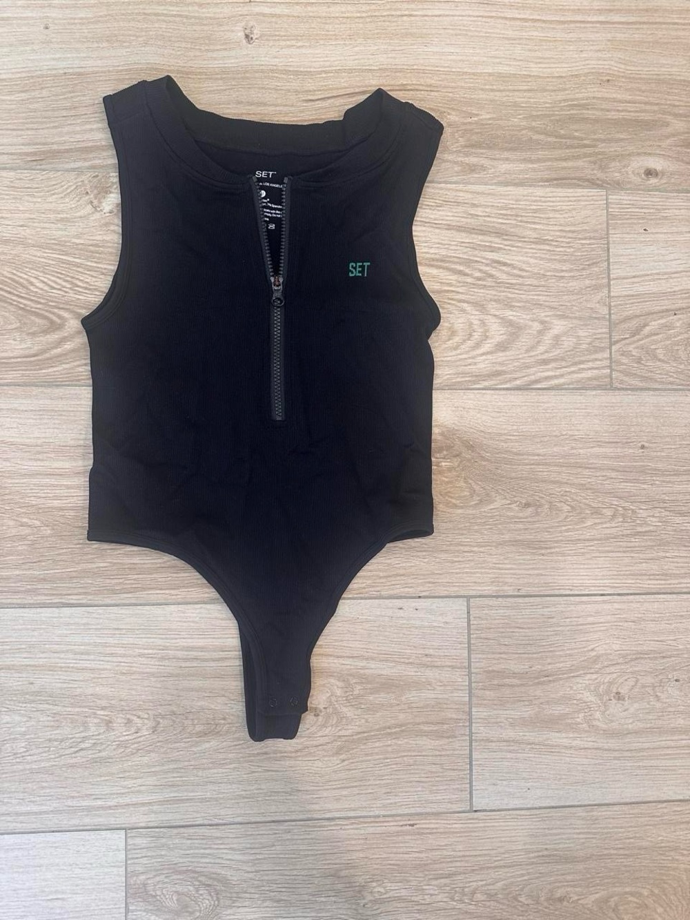 SET Active Black Sleeveless Zip-Front Bodysuit with Green Logo